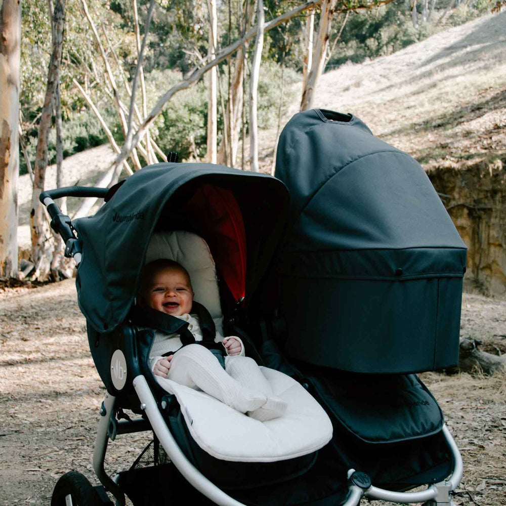 
                      
                        Organic Cotton Stroller Liner on Bumbleride Indie Twin in Dawn Grey Coral
                      
                    